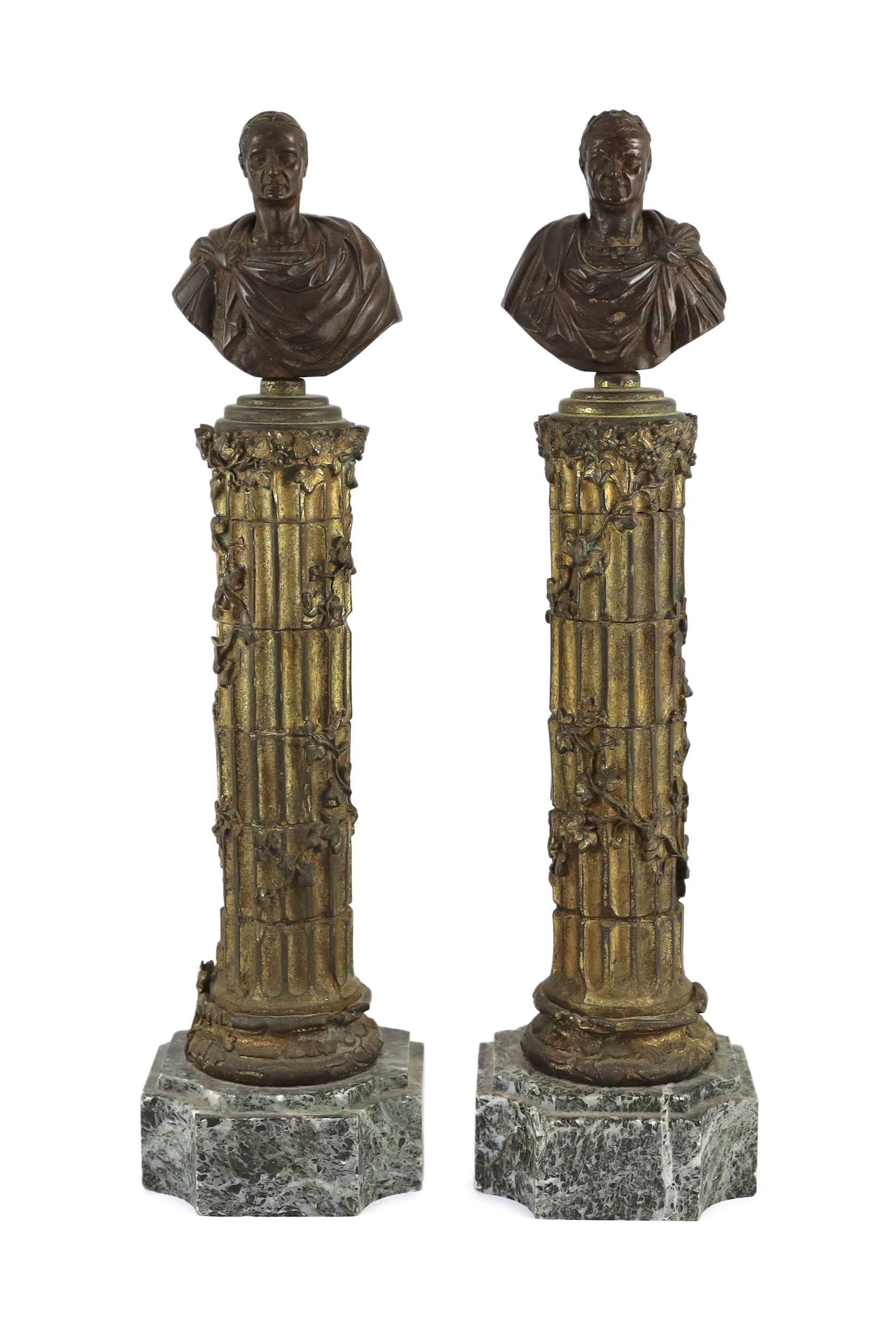 After the Antique. A pair of bronze busts of Roman Emperors, width of bases 12cm height 45cm